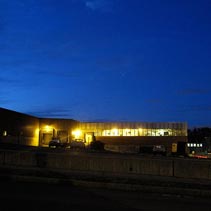 [American Metal Crafters building at dusk]