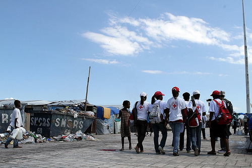 [British and Haitian Red Cross volunteers at La Piste camp]