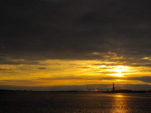 [Statue of Liberty at sunset]